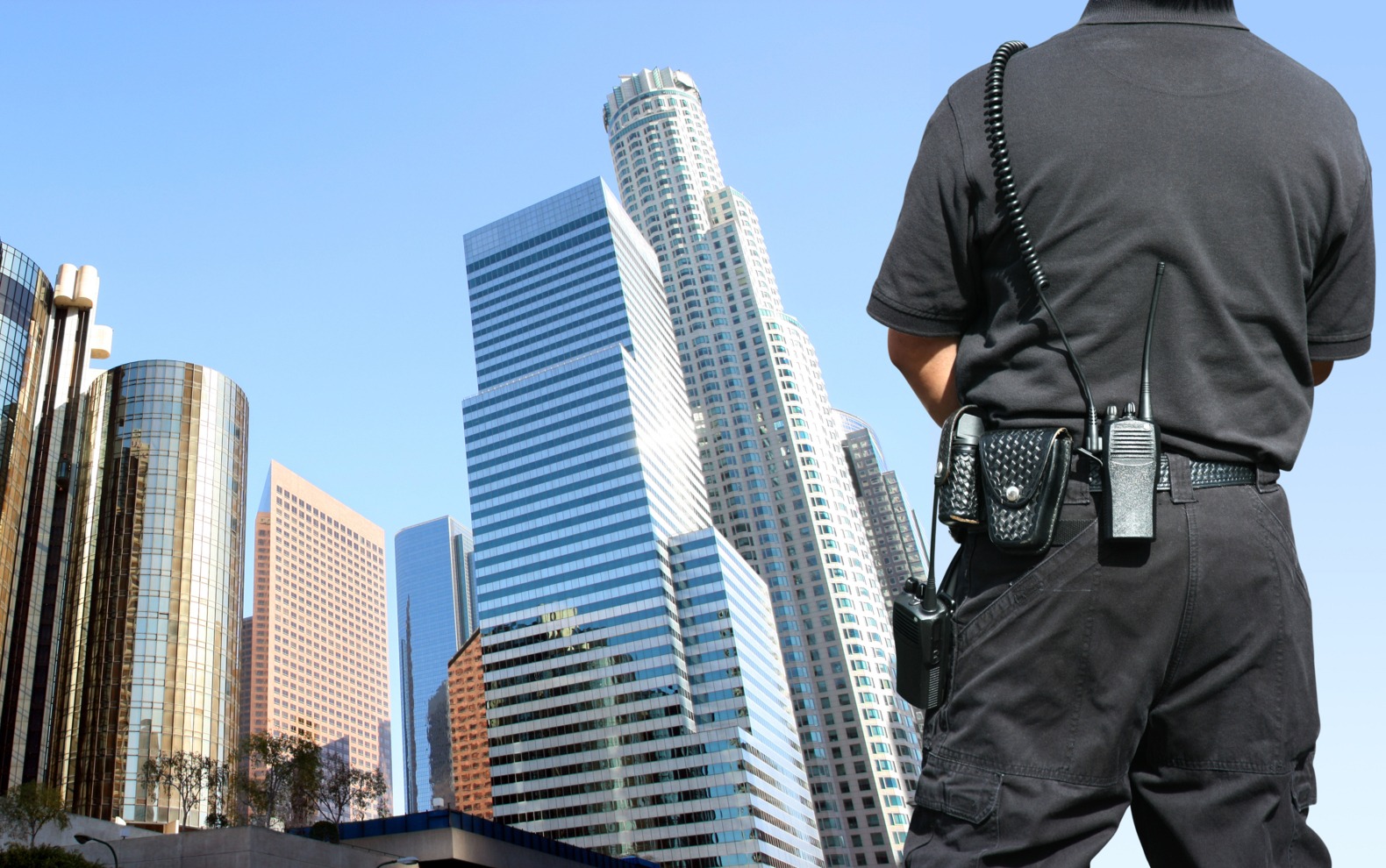 Security agent watching downtown area;
